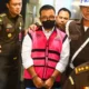 Image Credit Rivan Awal Lingga/Antara - Komisaris PT Navigator Khatulistiwa juga Komisaris PT Jenggala Maritim Dimas Werhaspati (tengah) ditahan setelah ditetapkan sebagai tersangka kasus dugaan korupsi tata kelola minyak mentah dan produk kilang PT Pertamina Subholding dan KKKS 2018-2023 di Kejagung, Jakarta, Selasa (25/2/2025).