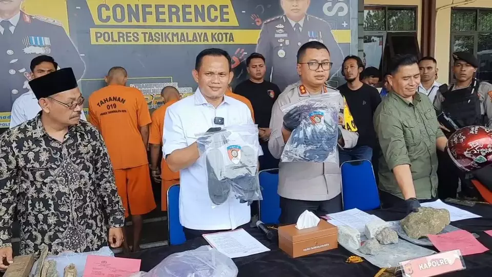 Image Credit Muhammad Rifki Saebani/Beritasatu - Polisi menangkap sembilan tersangka yang melakukan penganiayaan terhadap seorang pelajar di Tasikmalaya.