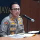 Image Credit Ilham Oktafian/Beritasatu - Kabid Humas Polda Metro Jaya Kombes Ade Ary Syam Indradi menjelaskan Polda Metro Jaya menerima laporan terkait kericuhan dalam rapat pembahasan revisi Undang-Undang Nomor 34 Tahun 2004 tentang Tentara Nasional Indonesia (UU TNI) oleh panitia kerja (Panja) di Jakarta pada Sabtu, 15 Maret 2025.