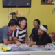 Suasana rumah duka almarhum Bripka Sopan Sembiring, Sabtu 12 April 2025.