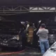 Garasi mobil mewah milik mantan anggota DPR Azam Azman Natawijana di Perumahan Sidosermo Indah Dua, Wonocolo, Surabaya, Jawa Timur terbakar, Jumat (18/4/2025) sore. (Beritasatu/Achmad Ali)