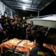 Imaga Credit Dian Hadiyatna/Antara - Salah satu jenazah polisi yang gugur saat bertugas saat penggerebekan judi sabung ayam di Kabupaten Way Kanan. Lampung, Selasa (18/3/2025).