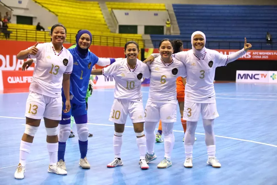 Image Credit Istimewa - Para pemain Timnas Futsal Putri Indonesia setelah memastikan lolos ke putaran final AFC Women’s Futsal Asian Cup 2025 dengan menundukkan India di GOR AMong Rogo, Yogyakarta.