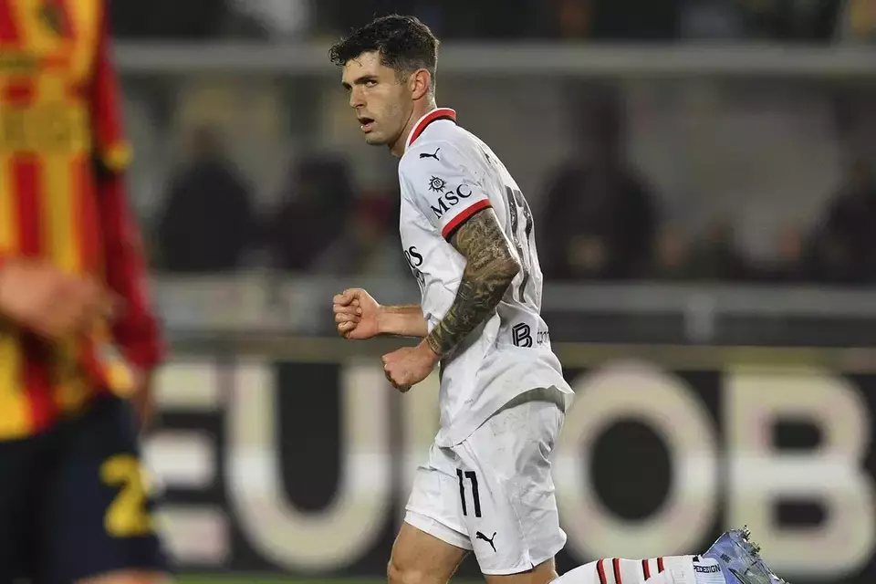 Image Credit AP - Pemain AC Milan Christian Pulisic merayakan golnya dalam pertandingan sepak bola Liga Italia Serie A melawan Lecce di Stadion Via del Mare.