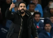 Ruben Amorim menjadi pelatih The Red Devils kedua yang memenangkan derby Manchester Liga Inggris dalam jabatan pertamanya. Catatan pertama dipegang mantan manajer legendaris klub Sir Alex Ferguson. (Paul ELLIS/AFP)