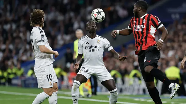 Bek Real Madrid asal Prancis Ferland Mendy (tengah) ditantang oleh gelandang Amerika AC Milan Yunus Musah selama pertandingan sepak bola hari ke-4 fase liga Liga Champions UEFA antara Real Madrid CF dan AC Milan di stadion Santiago Bernabeu di Madrid pada tanggal 5 November 2024.OSCAR DEL POZO / AFPBek Real Madrid asal Prancis Ferland Mendy (tengah) ditantang oleh gelandang Amerika AC Milan Yunus Musah selama pertandingan sepak bola hari ke-4 fase liga Liga Champions UEFA antara Real Madrid CF dan AC Milan di stadion Santiago Bernabeu di Madrid pada tanggal 5 November 2024.OSCAR DEL POZO / AFP