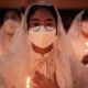 Tri Hari Suci atau tiga hari suci terdiri dari Misa Kamis Putih, Jumat Agung, dan Sabtu Suci. (Yasuyoshi CHIBA/AFP)