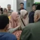 Image Credit Irfandi/Beritasatu - Istri Aipda Arham meminta penjelasan polisi untuk mengungkapkan kematian misterius suaminya itu.