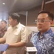 Image Credit Erfan Maruf/Beritasatu - Menteri Perumahan dan Kawasan Permukiman (PKP) Maruarar Sirait dan Direktur Utama PT GoTo Gojek Tokopedia Tbk (GOTO) Patrick Sugito Walujo (kanan) saat mengumumkan soal rencana 2.000 rumah subsidi akan disiapkan khusus bagi para mitra pengemudi ojek online (driver ojol) roda dua dan empat dari Gojek.